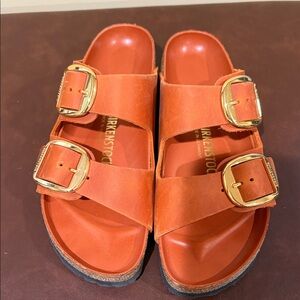 Birkenstock Orange Double-Strap Sandals with Gold Buckles